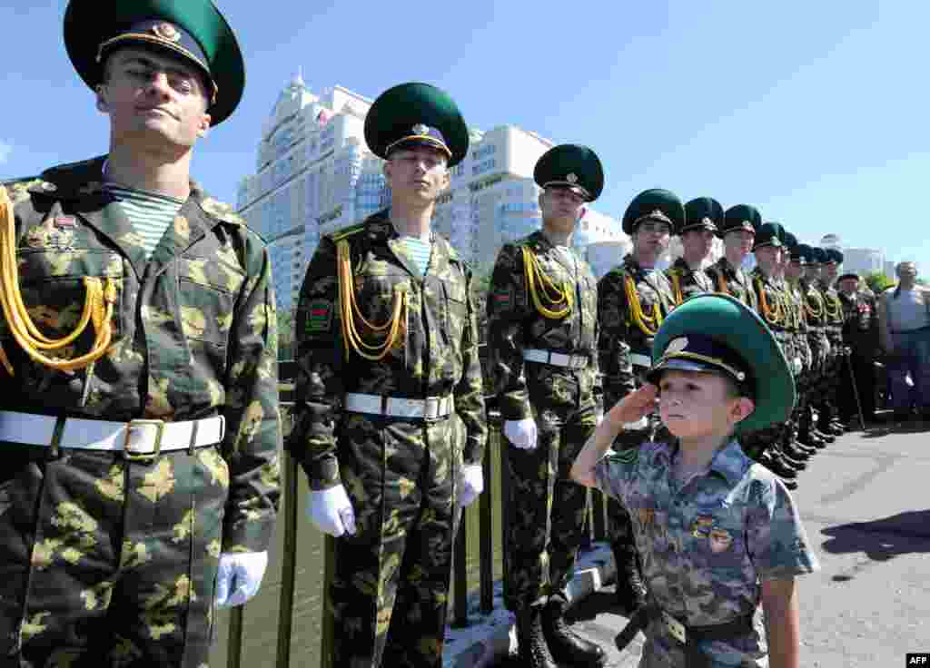 Belarusian border guards celebrate their agency's day in Minsk on May 28. (AFP/Viktor Drachev)