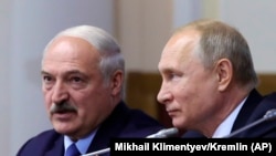 Александр Лукашенко и Владимир Путин на встрече в Санкт-Петербурге, 18 июля 2019 года