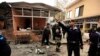 Policemen secure the site of a bomb attack in Islamabad, March 3, 2014.