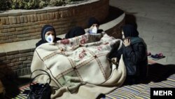 PHOTO GALLERY: Sleepless In Iran: After Latest Earthquake, Tehranis Brave The Cold