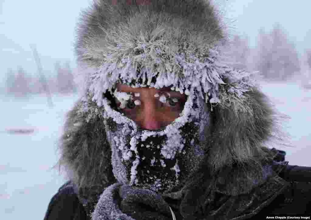 Photographer Amos Chapple while working in Oymyakon. The New Zealander says he occasionally had to avoid drunks in the town who threatened him with violence.