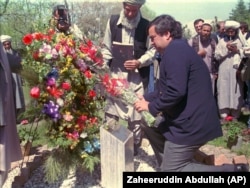 U.S. Ambassador to the UN Bill Richardson lays a wreath on a monument to Adolph Dubs in Kabul on April 17, 1998.