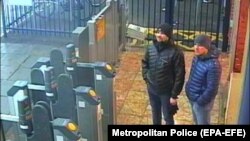 Russian suspects Aleksandr Petrov (right) and Ruslan Boshirov stand at Salisbury train station on March 3.