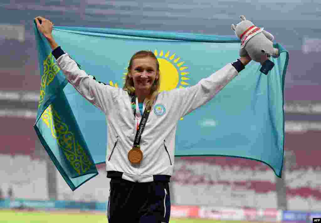 Жеңіл атлет Ольга Рыпакова үш қарғып секіруден Джакартада алтын жүлдеге ие болды. Рыпакова төрт Азиадада қатар чемпион атанды. 30 тамыз 2018 жыл.