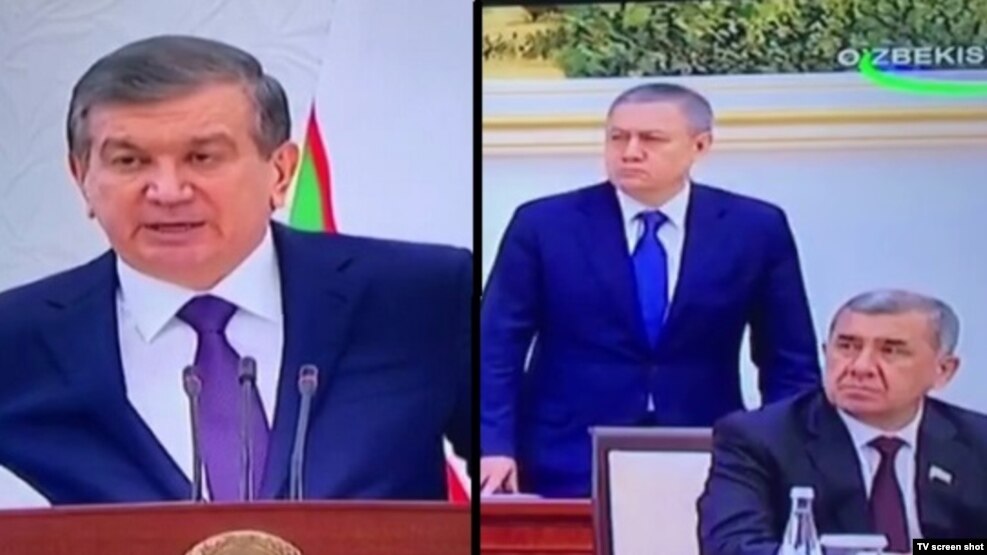 Президент Шавкат Мирзиёев (чапда) ва мажлисда тик туриб, танқид эшитган Молия вазири Рустам Азимов