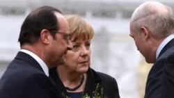 Франсуа Алянд, Ангела Мэркель і Аляксандар Лукашэнка ў Менску, люты 2015