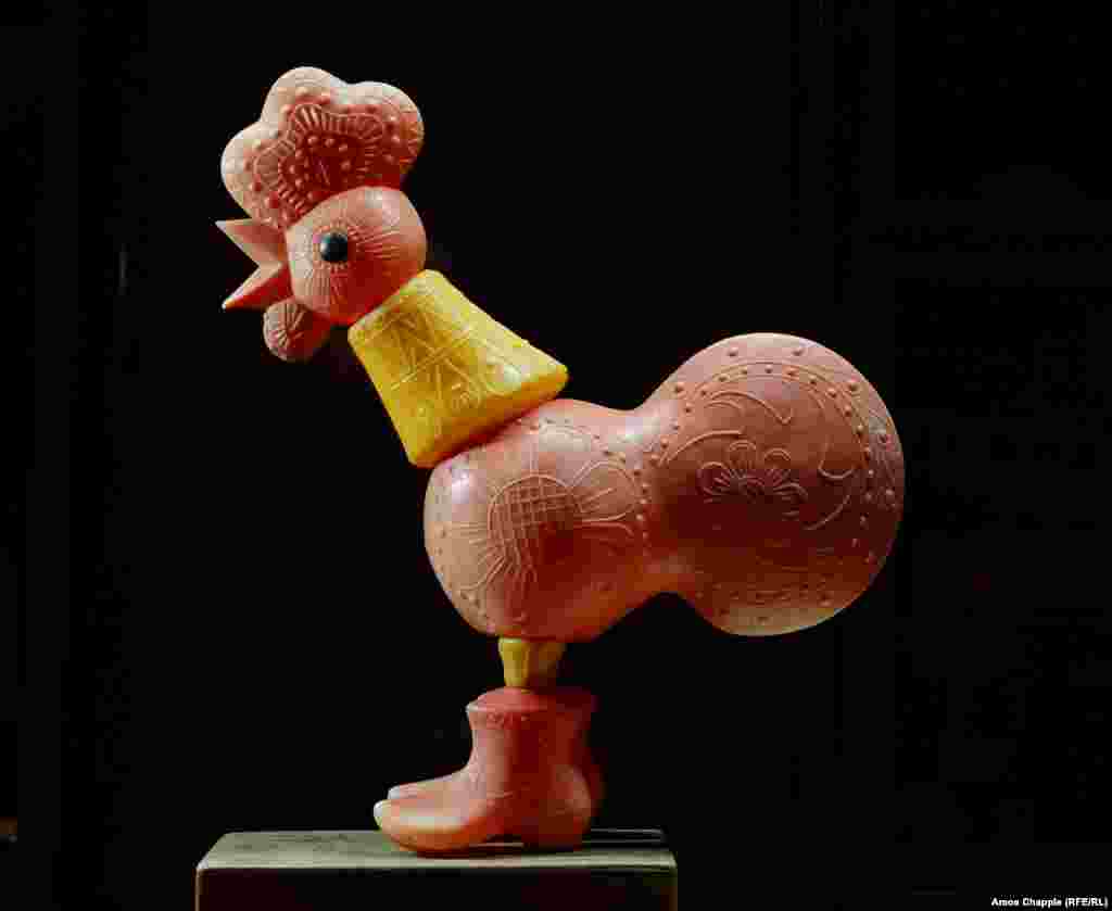 A booted rooster toy made by the famous Aradeanca toy factory in Arad.