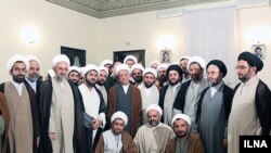 Ali Akbar Hashemi Rafsanjani (stands C) meets with clerics in Qom