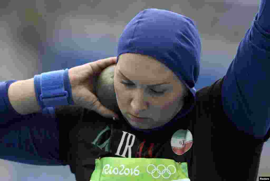 Leyla Rajabi of Iran competes in the women's shot put qualifying round.