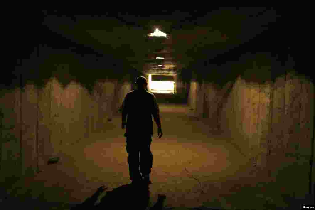 A hallway leads to the factory's shooting range.