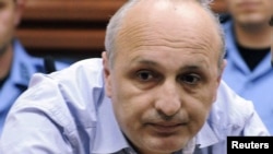 Former Georgian Prime Minister Vano Merabishvili, at a court hearing in Kutaisi last year, says the charges are politically motivated.