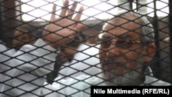 المرشد العام لجماعة الأخوانالمسلمين أثناء جلسة محاكمة في القاهرة