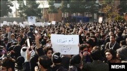 Students protest in Behsheti University on 7 December 2013. The placard reads "No to security environment."