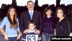 Azerbaijani President Ilham Aliyev (second from left) and members of his family have been linked to money placed in offshore accounts. (file photo)