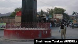 FILE: A policeman directs traffic in Loralai, the administrative center of a rural district of the same name in the southwestern province of Balochistan.