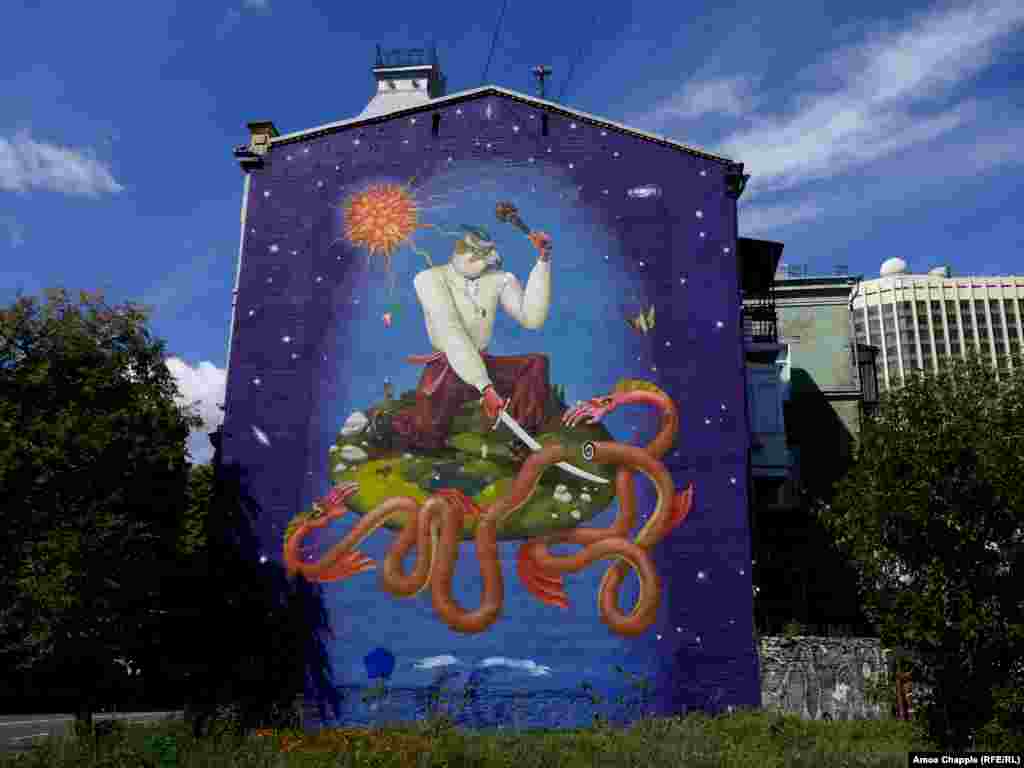 Ukrainian Saint George, by local duo Interesni Kazki, features a serpent grasping at both the east and west of the land. The artists wrote on their website that the serpent represents both Russia and the NATO bloc: "For Ukraine, these two civilizations, in essence, are one snake-monster..."