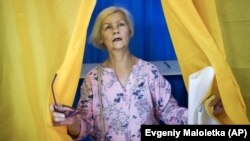 В Україні 21 липня відбуваються дострокові парламентські вибори