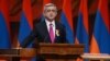 Armenia - President Serzh Sarkisian is holding his right hand on the Bible and the Constitution during his inauguration, Yerevan,09Apr2013