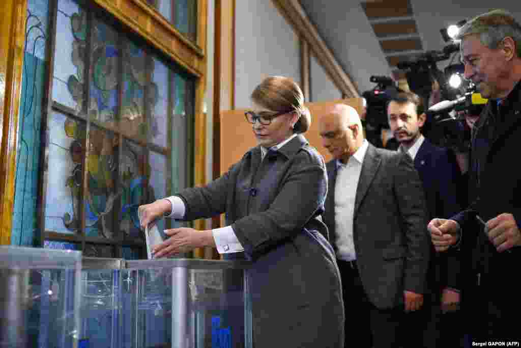 Former Ukrainian Prime Minister and presidential candidate Yulia Tymoshenko casts her ballot at a polling station in Kyiv. (AFP/Sergei Gapon)