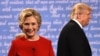 АҚШ президенттігіне кандидаттар демократ Хиллари Клинтон (сол жақта) мен республикашыл Дональд Трамп (оң жақта) алғашқы дебаттан кейін. Нью-Йорк, 26 қыркүйек 2016 жыл