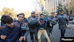 Armenia -- Riot police scuffle with protesters outside the Constitutional Court, Yerevan, 14Nov2014