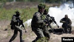 Polish Army soldiers take part in a NATO military exercise in June 2016.