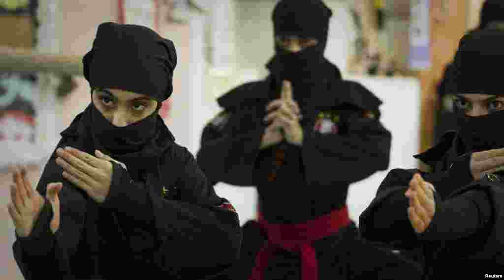 Ninjutsu practitioners from various schools showcase their skills to the media in a gym at Karaj, northwest of Tehran.