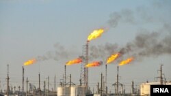Excess natural gas burning in an oil field in Iran. Undated. File photo.