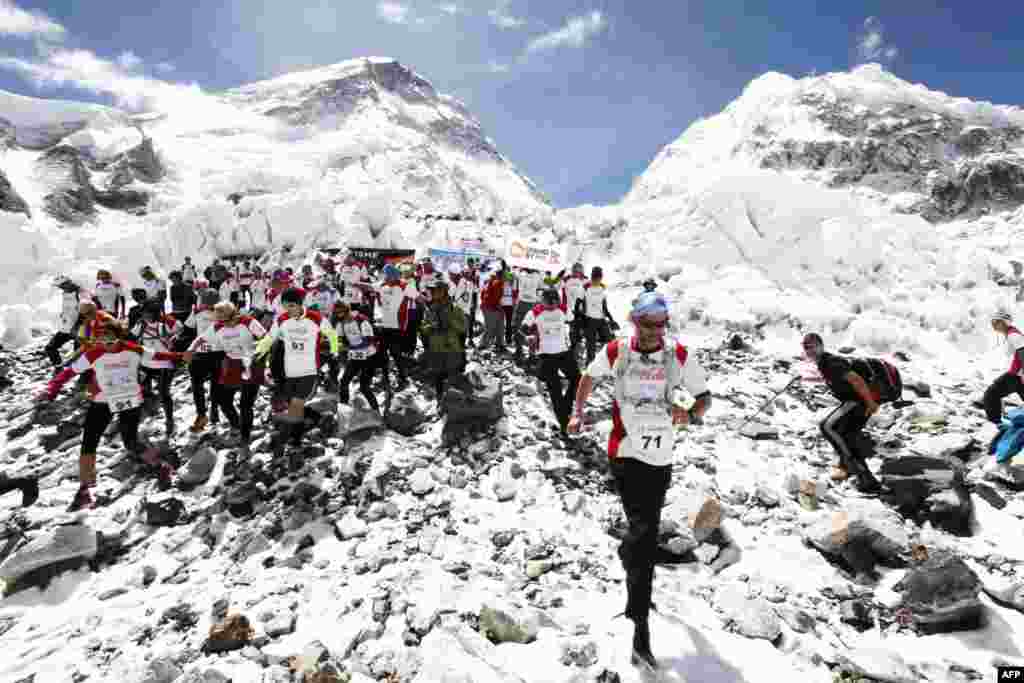 Participants in the Tenzing-Hillary Everest Marathon get the race under way at Everest Base Camp.