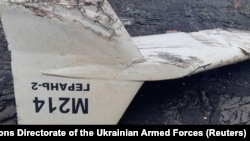 Part of an unmanned aerial vehicle, described by the Ukrainian military leadership as an Iranian suicide drone, which was shot down near the city of Kupyansk in Ukraine's Kharkiv Oblast earlier this month. 