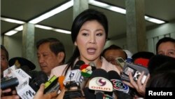 Tajlandë - Kryeministrja Yingluck Shinawatra gjatë një konference për gazetarë në Bangkok (Ilustrim)