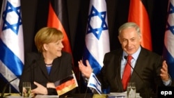 German Chancellor Angela Merkel (left) and Israeli Prime Minister Benjamin Netanyahu hold a joint press conference in Jerusalem on February 25.