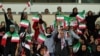 Iranian women - most of them family of players, federation employees and relatives, are allowed for the first time to take part at the friendly soccer match between Iran and Bolivia at the Azadi Stadium in Tehran, October 16, 2018