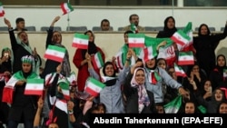 Iranian women - most of them family of players, federation employees and relatives, are allowed for the first time to take part at the friendly soccer match between Iran and Bolivia at the Azadi Stadium in Tehran, October 16, 2018