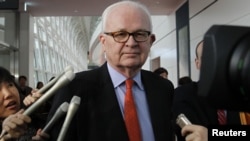 U.S. special envoy to North Korea Stephen Bosworth speaks to reporters upon his arrival at the airport in Tokyo.