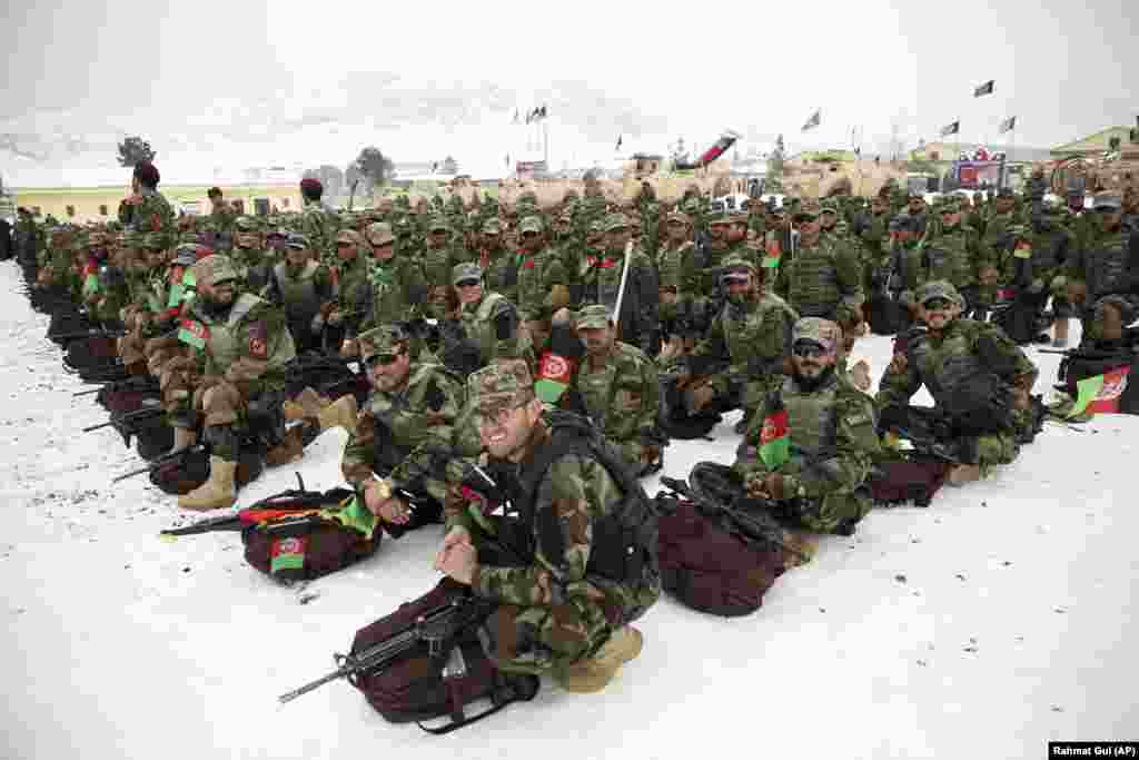 Afghan National Army commandos attend their graduation ceremony on January 13 after a 3 1/2-month training program at the Commando Training Center on the outskirts of Kabul.&nbsp;(AP/Rahmat Gul)