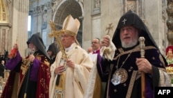 Vatican - Aram I (L), head of the Catholicosate of the Great House of Cilicia, Karekin II, Supreme Patriarch and Catholicos of All Armenians and Pope Francis (C) lead an Armenian-Rite mass marking 100 years since the Armenian Genocide.