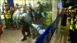Protesters Clash With Police At Hong Kong Airport