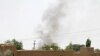 Smoke rises from a residential as the Taliban battled the Afghan security forces in Ghazni on August 10.