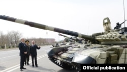 Azerbaijan - President Ilham Aliyev inspects T-90 tanks and other weapons purchased from Russia at a military base in Nakhichevan, 7Apr2014.