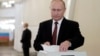 Ruski predsjednik Vladimir Putin tokom glasanja u Moskvi