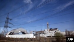 The first half of the Chornobyl New Safe Confinement, or NSC, an arch that will cover the damaged reactor.