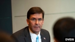 Secretary of Defense Dr. Mark T. Esper meets with reporters in London, England, Sept. 5, 2019.