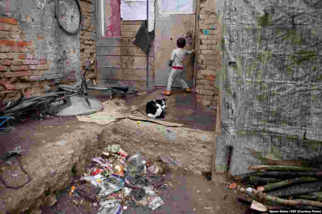 A boy returns home on Budulovskej Street.