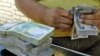 A stack of currency at a stall in central Baghdad's Fardus Square (file photo)