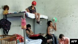 Georgian displaced people from Abkhazia's Kodori Gorge take shelter at a school in Tbilisi.