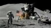 SPACE - Astronaut James Irwin, lunar module pilot, gives a military salute while standing beside the U.S. flag during Apollo 15 lunar surface extravehicular activity (EVA) at the Hadley-Apennine landing site on the moon, August 1, 1971