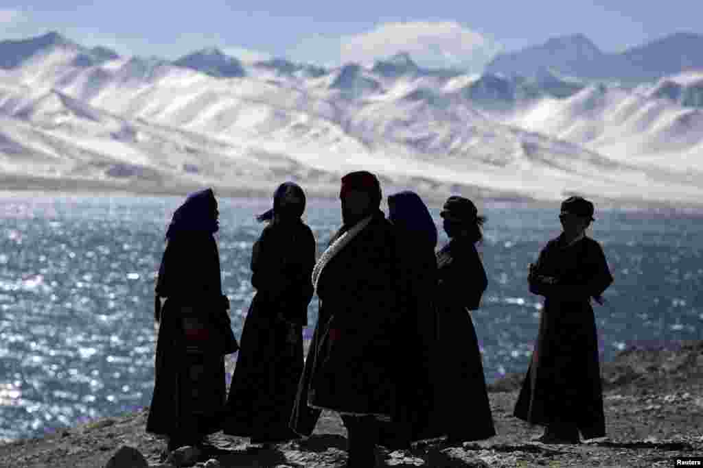 Tibetans visit Namtso in the Tibet Autonomous Region. Located about four hours' drive from Lhasa at an altitude of around 4,718 meters above sea level, the lake is not only the highest saltwater lake in the world but also considered sacred, attracting throngs of devotees and pilgrims. (Reuters/Damir Sagolj)