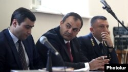 Armenia -- Prosecutor-General Artur Davtian (C) at the opening session of former President Robert Kocharian's trial in Yerevan, May 13, 2019.