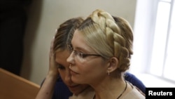 Yulia Tymoshenko and her daughter, Yevhenia, at a court session in Kyiv in October, when the former prime minister was convicted.